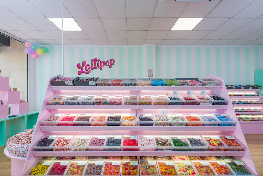 The Lollipop candy wall with rows of Swedish pick-and-mix